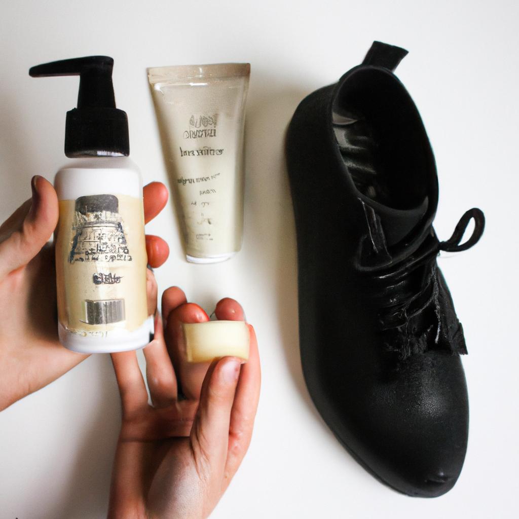 Person holding shoe care products
