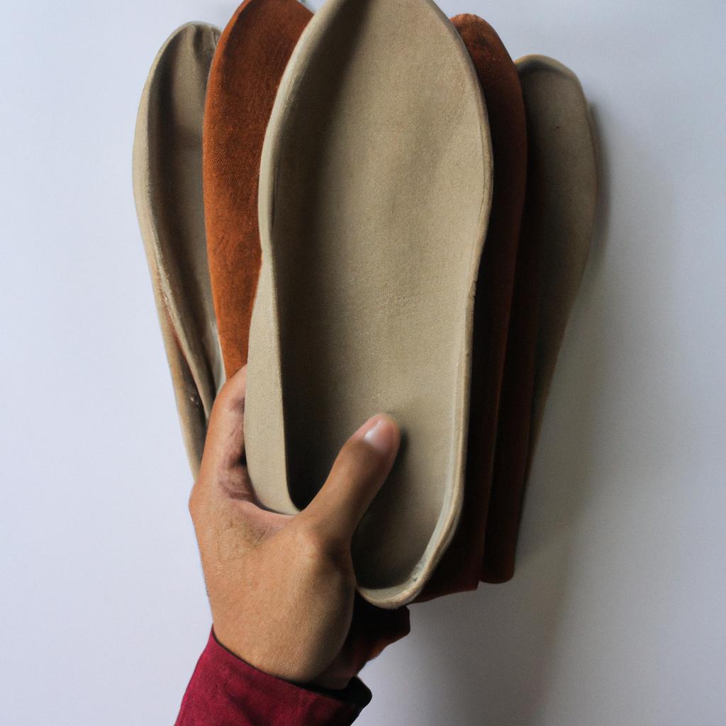 Person holding suede shoe material
